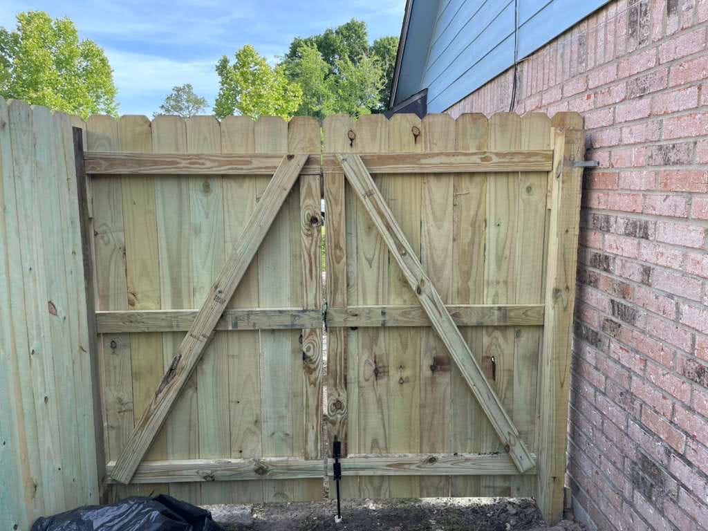 New wood double gate with bracing