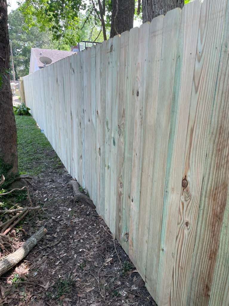 New wood privacy fence installed by Binder's Landscapes